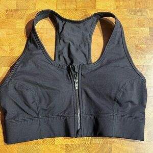 Fabletics On-The-Go Zip MEDIUM Impact Sports Bra Black Size S